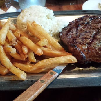 Salmon Bake Restaurant - Rib Eye Steak with Garlic rice and French Fries - American Near Me - Seward, Alaska Salmon Bake Restaurant - Rib Eye Steak with Garlic rice and French Fries - American Near Me - Seward, Alaska