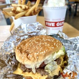 Cheeseburger with two patties, large fries, and a vanilla shake. Cheeseburger with two patties, large fries, and a vanilla shake.