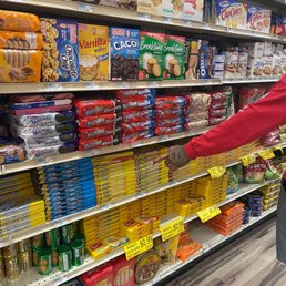 a woman shopping in a grocery store a woman shopping in a grocery store