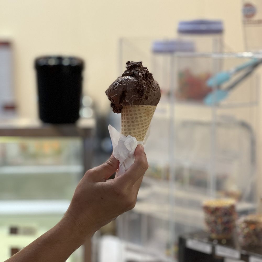 Milwaukee Joe's - a person holding a cone of ice cream - Ice Cream & Frozen Yogurt Near Me - Southlake, Texas Milwaukee Joe's - a person holding a cone of ice cream - Ice Cream & Frozen Yogurt Near Me - Southlake, Texas