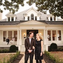 The Stratton House Bed and Breakfast - Owners Katie and Hampton Parr in front of The Stratton House. Photo by Cindy Thymius Photography