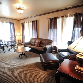 The Alcalde Hotel - 1 King Bedroom Suite Living Space - Hotels Near Me - Gonzales, Texas The Alcalde Hotel - 1 King Bedroom Suite Living Space - Hotels Near Me - Gonzales, Texas