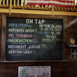 Four Fathers Brewing - Beer menu list. Tasty IPA I had was tasty. The Potter was rich almost tasted like coffee. Yummy. Will try again.