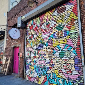 La Newyorkina - a colorful mural on the side of a building - Specialty Food Near Me - New York, New York La Newyorkina - a colorful mural on the side of a building - Specialty Food Near Me - New York, New York