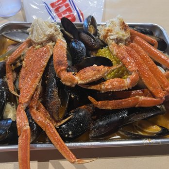 Ocean Crab - AYCE snow crab, green mussels, black mussels, sausage, 1 corn, 1 potato, 1 hard boiled egg. Mixed 3 sauces. - Seafood Near Me - Chantilly, Virginia Ocean Crab - AYCE snow crab, green mussels, black mussels, sausage, 1 corn, 1 potato, 1 hard boiled egg. Mixed 3 sauces. - Seafood Near Me - Chantilly, Virginia