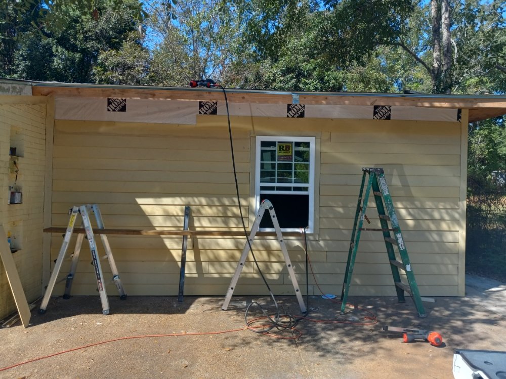 Slide of DJ'S Construction Roofing Siding & Framing