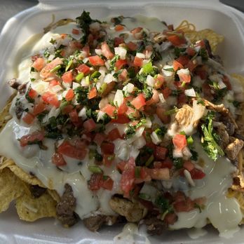 Taqueria Angel - Chicken and Steak Nachos - Tacos Near Me - Maumelle, Arkansas Taqueria Angel - Chicken and Steak Nachos - Tacos Near Me - Maumelle, Arkansas