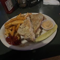 Louie's Pub & Grill - Ruben Sandwich -Amazing! Fries had a spicy seasoning but loved them with some ketchup!