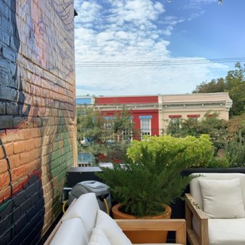 The Pit and The Peel - a patio with a couch and chairs - Juice Bars & Smoothies Near Me - Richmond, Virginia The Pit and The Peel - a patio with a couch and chairs - Juice Bars & Smoothies Near Me - Richmond, Virginia