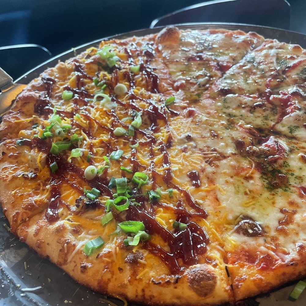 Two Cities Pizza - Half margarita and half Gothic gangster pizza - Pizza Near Me - Suwanee, Georgia Two Cities Pizza - Half margarita and half Gothic gangster pizza - Pizza Near Me - Suwanee, Georgia