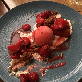 REDD - Strawberries and creme with strawberry sorbet and granola. - New American Near Me - Rochester, New York