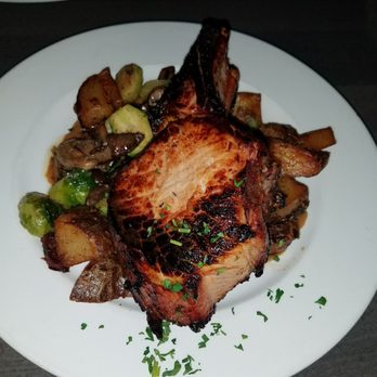 Summit Grill - Pork chop with potatoes and brussel sprouts - Bars Near Me - Lee's Summit, Missouri
