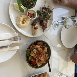 Sahra by the River - Mixed Grill with chicken, lamb and kofte, Fattoush Salad and meat pies.