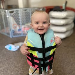 Alpha One Water Sports - Our VP of Customer Service, Ashley demonstrates the proper use of life jackets.