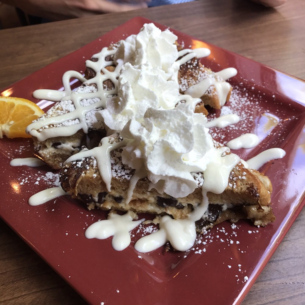 Toasted Mango Cafe - Almond joy stuffed French toast. It was the special today and was the best ever! - Cafes Near Me - Sarasota, Florida Toasted Mango Cafe - Almond joy stuffed French toast. It was the special today and was the best ever! - Cafes Near Me - Sarasota, Florida