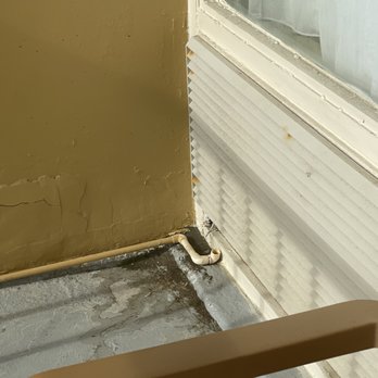 Comfort Inn South Oceanfront - Air conditioner system unhooked so it just leaks and creates mold on the deck. - Hotels Near Me - Nags Head, North Carolina