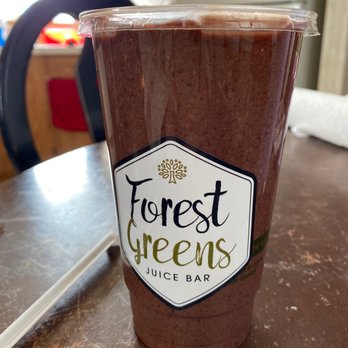 Forest Greens Juice Bar - a cup of coffee on a table - Juice Bars & Smoothies Near Me - Lake Bluff, Illinois Forest Greens Juice Bar - a cup of coffee on a table - Juice Bars & Smoothies Near Me - Lake Bluff, Illinois