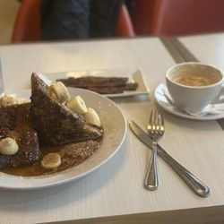 Sabrina's Cafe - Stuffed French toast, side of bacon, cappuccino