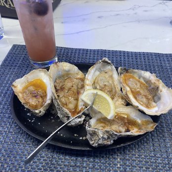 Whiskey & Oyster - Grilled oysters (with chipotle bourbon) and a rum punch. - Bars Near Me - Alexandria, Virginia