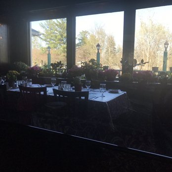 Falletta's Restaurant - Dining table and floral arrangements - Italian Near Me - East Amherst, New York