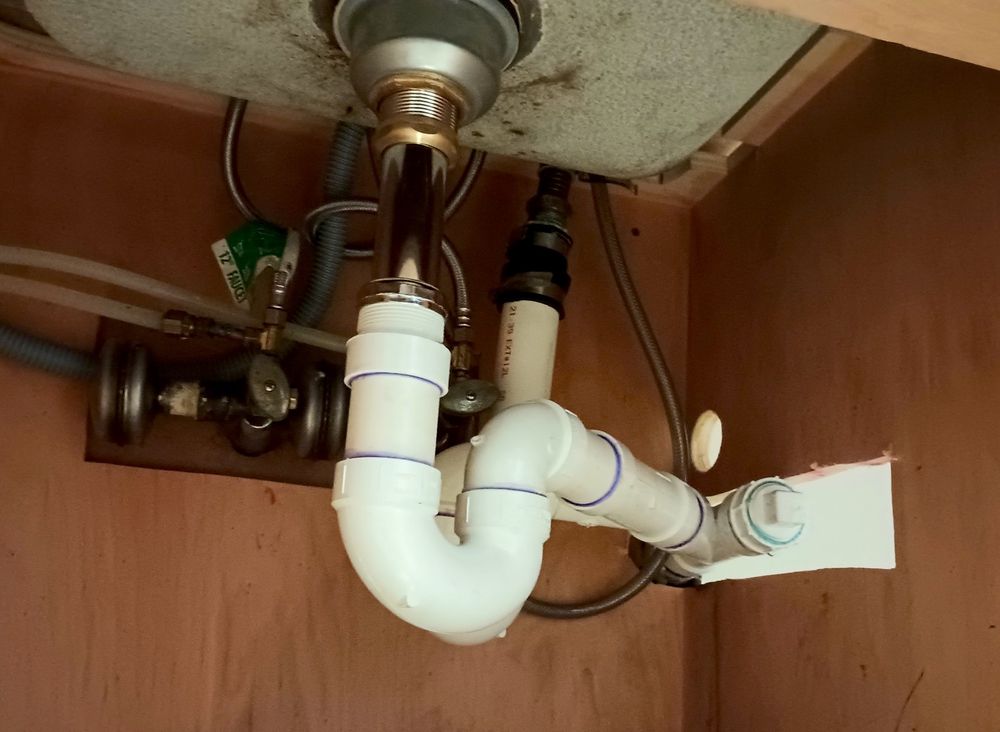 Slide of AT Plumbing Services