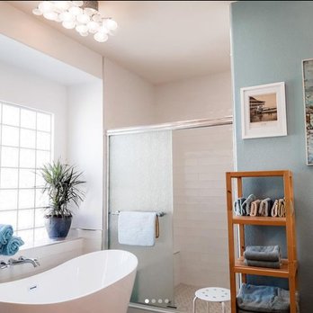 Vegas Remodels - a bathroom with a bathtub - General Contractors Near Me Vegas Remodels - a bathroom with a bathtub - General Contractors Near Me