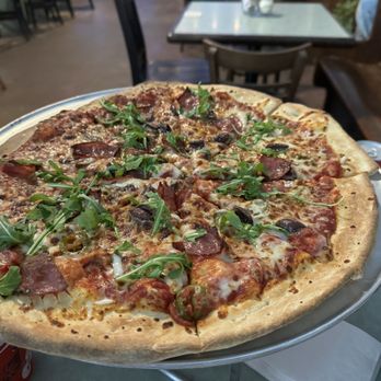 Saint Joe’s Pizza - Hand tossed wit salami n arugula - Pizza Near Me - Gainesville, Texas