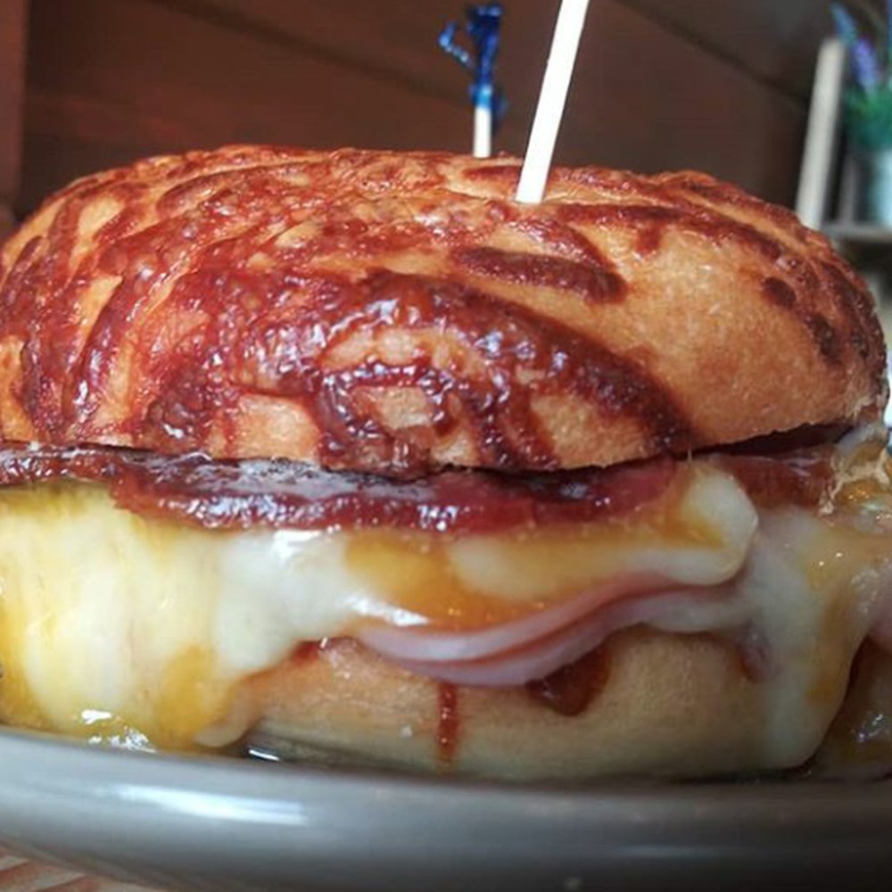 Unwind Cafe - Ham and Swiss on a Parmesan Bagel. - Coffee & Tea Near Me - Seattle, Washington Unwind Cafe - Ham and Swiss on a Parmesan Bagel. - Coffee & Tea Near Me - Seattle, Washington