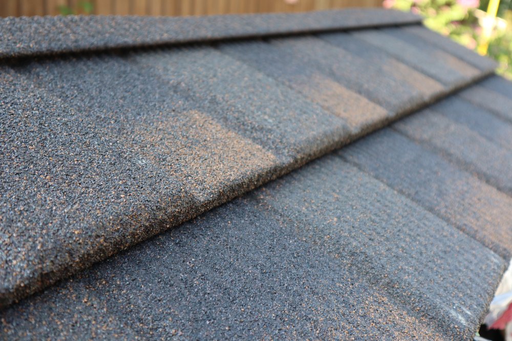 Slide of Steele Roofing