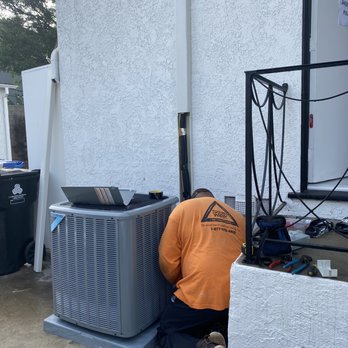 Southwest HVAC - Men at work - installing the AC condenser - Heating & Air Conditioning/HVAC Near Me - Downey, California Southwest HVAC - Men at work - installing the AC condenser - Heating & Air Conditioning/HVAC Near Me - Downey, California