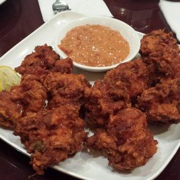 Chicken pakora. 10 peices for 10.75. Crunchy, moist and with a tangy dipping sauce.  A definite order.