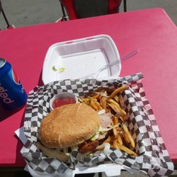 The Pit Stop - Chicken cordon blue burger with a side of fries.