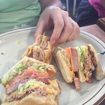 Bett's Big T - Turkey and ham combo club- it's half eaten here. - American Near Me - Chiefland, Florida Bett's Big T - Turkey and ham combo club- it's half eaten here. - American Near Me - Chiefland, Florida