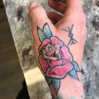 Epic Tattoos - Tradition rose.  Cut up in several places - Tattoo Near Me - Fort Worth, Texas
