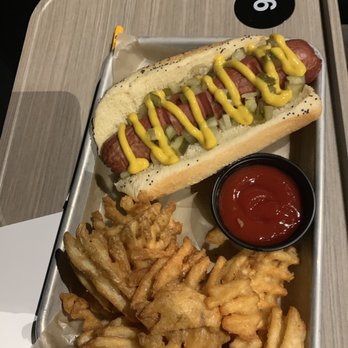 Skylight Cinema - All American hotdog with waffle fries. - Cinema Near Me - Bentonville, Arkansas