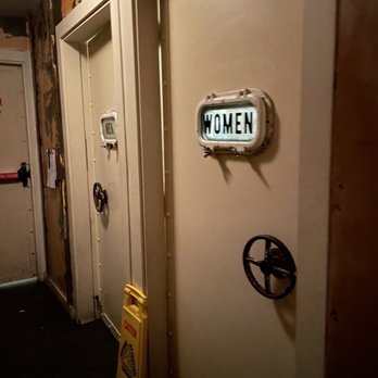 theBoil - a women's restroom with a sign on the door - Cajun/Creole Near Me - New York, New York theBoil - a women's restroom with a sign on the door - Cajun/Creole Near Me - New York, New York
