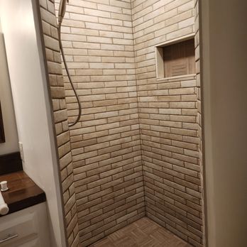 Jenny and Sons - a shower in a bathroom - General Contractors Near Me Jenny and Sons - a shower in a bathroom - General Contractors Near Me