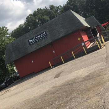The Alibi Bar & Grill - View of building from parking lot - Bars Near Me - Ionia, Michigan