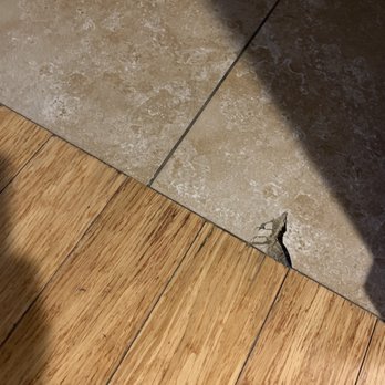 Hotel CURRENT - Cracked broken tiling ripping at your bare feet should you walk towards the bed. - Hotels Near Me - Long Beach, California Hotel CURRENT - Cracked broken tiling ripping at your bare feet should you walk towards the bed. - Hotels Near Me - Long Beach, California