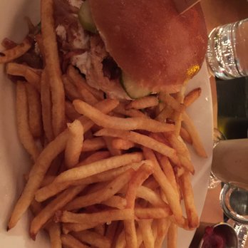 The Smith - Burger cooked medium well with goat cheese and fries - New American Near Me - New York, New York The Smith - Burger cooked medium well with goat cheese and fries - New American Near Me - New York, New York