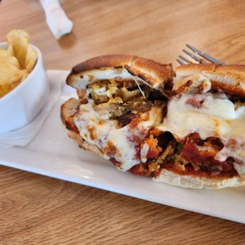 Sally O'Neal's Pizza Hotline - Eggplant parm sub with chips - Pizza Near Me - Tampa, Florida Sally O'Neal's Pizza Hotline - Eggplant parm sub with chips - Pizza Near Me - Tampa, Florida
