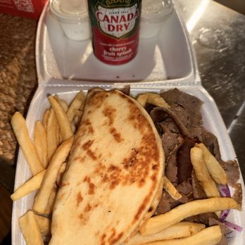 Uptown Pizza & BBQ - Gyro with fries, American cheese added to the pita, and tzatziki on the side. Unfortunately, the gyro meat was much too salty for my taste. - Pizza Near Me - Chicago, Illinois