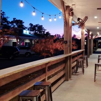 Salty Turtle Beer Company - More seating around the side. Not pictured is all of the seating in the front. - Breweries Near Me - Surf City, North Carolina Salty Turtle Beer Company - More seating around the side. Not pictured is all of the seating in the front. - Breweries Near Me - Surf City, North Carolina
