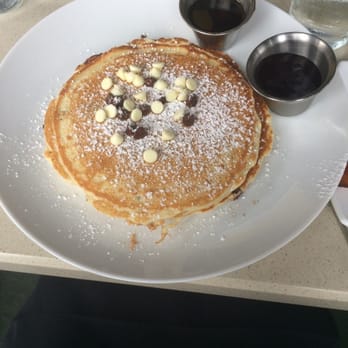 Monarch - Chocolate chip pancakes with blueberry glaze. - New American Near Me - Houston, Texas Monarch - Chocolate chip pancakes with blueberry glaze. - New American Near Me - Houston, Texas