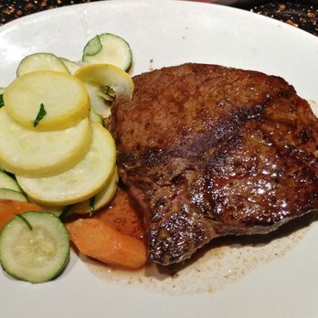 Outback Steakhouse - 8 oz. Center-Cut Sirloin cooked medium with fresh seasonal mixed veggies. - Steakhouses Near Me - Alexandria, Virginia Outback Steakhouse - 8 oz. Center-Cut Sirloin cooked medium with fresh seasonal mixed veggies. - Steakhouses Near Me - Alexandria, Virginia