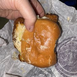 McDonald's - This is a bite out of a sandwich I ordered from McDonald's. No I did not take the bite. I opened it up this way!!!!
