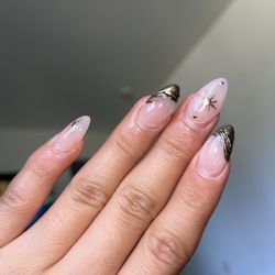 BJ's Happy Nail Spa - Almond shape with chrome design. I was charged 75. The chrome started to peel off within a week.