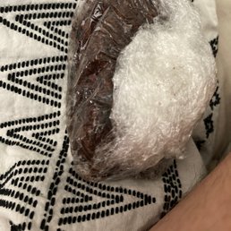 The brownie looks like it's been opened and it's small and crusty The brownie looks like it's been opened and it's small and crusty