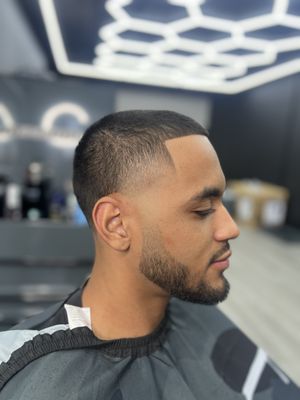 Relentless Barber Studio - Welcome to Relentless Barber Studio, where precision meets passion in every cut. Located in the heart of Norco, CA, our studio offers a haven for those seeking more than just a haircut—it’s an experience. At Relentless, we specialize in fades, tapers, kids cuts, beard trims, designs, gentlemen’s cuts, fohawks, and indulgent hot towel shaves. Our team of skilled barbers are dedicated to delivering top-notch service with attention to detail, ensuring each client leaves feeling confident and refreshed. While appointments are recommended for your convenience, we understand the spontaneity of life. Walk-ins are not just welcomed, but accelerated, so you can always count on us for your grooming needs Relentless Barber Studio - Welcome to Relentless Barber Studio, where precision meets passion in every cut. Located in the heart of Norco, CA, our studio offers a haven for those seeking more than just a haircut—it’s an experience. At Relentless, we specialize in fades, tapers, kids cuts, beard trims, designs, gentlemen’s cuts, fohawks, and indulgent hot towel shaves. Our team of skilled barbers are dedicated to delivering top-notch service with attention to detail, ensuring each client leaves feeling confident and refreshed. While appointments are recommended for your convenience, we understand the spontaneity of life. Walk-ins are not just welcomed, but accelerated, so you can always count on us for your grooming needs