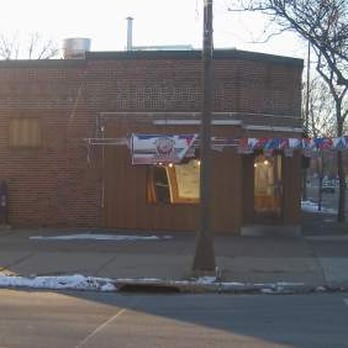 Sunlight - a corner of a brick building on a street corner - Cafes Near Me - South Saint Paul, Minnesota